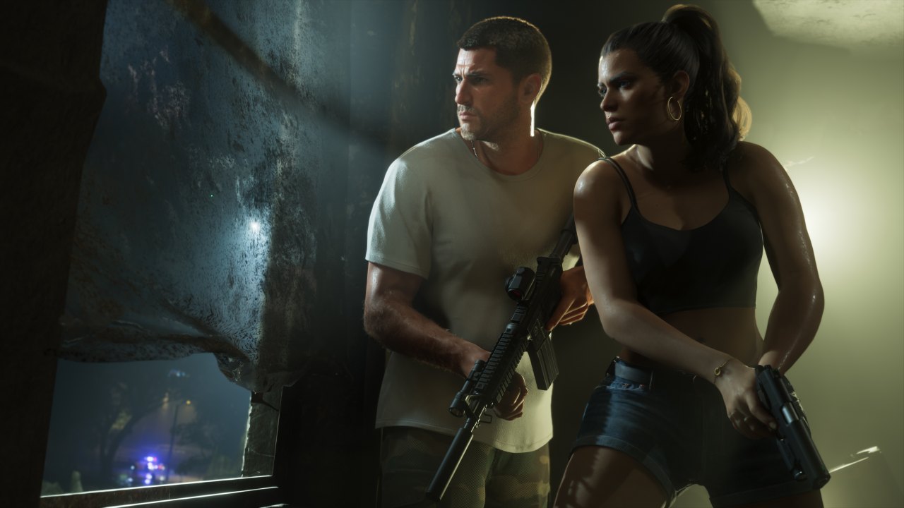 Jason and Lucia armed together indoors