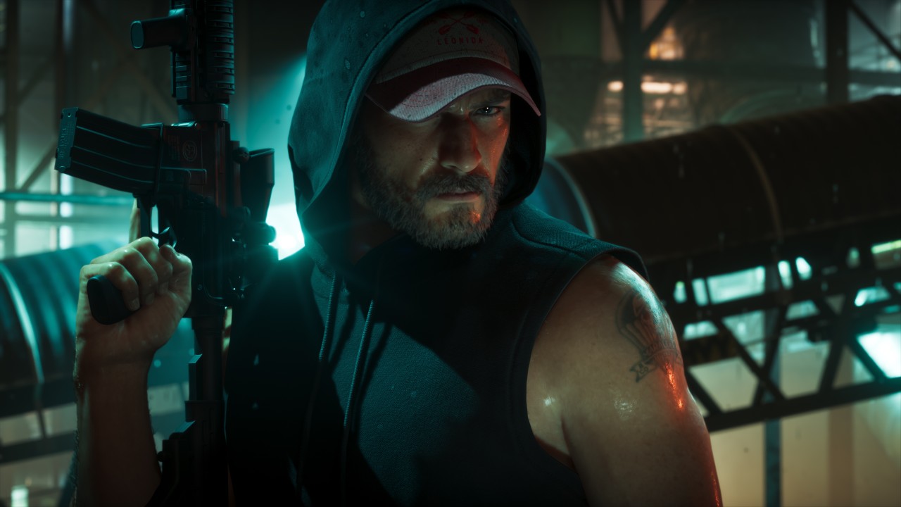 An armed character in the shadows