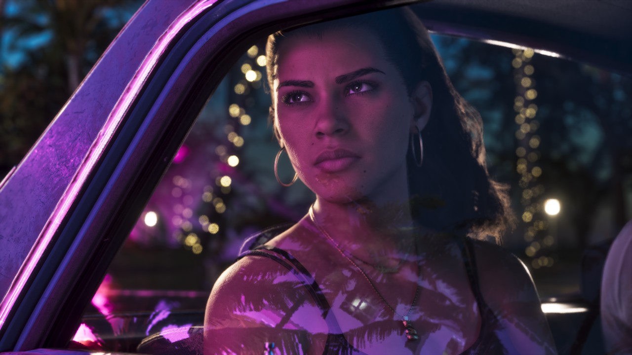 Lucia in a neon-lit car
